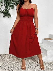 Elegant red sleeveless midi dress with smocked waist and tie-up front for summer beach vacation