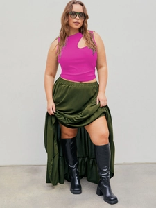 Fuchsia slim fit ribbed tank top with teardrop cutout paired with olive green satin skirt