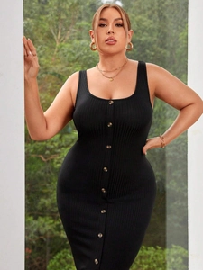 Detail of plus size black ribbed dress featuring decorative buttons and knit texture