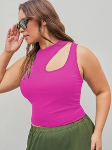 Detail of hot pink ribbed knit vest featuring unique shoulder cut-out design