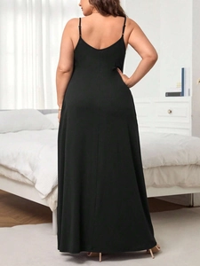 Women plus size black U-neck sleeveless maxi dress with low back design and slim fit silhouette