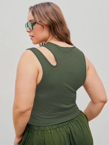 Detailed view of dark green ribbed knit tank top with unique back cutout design