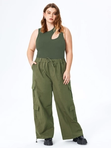 Detail of army green ribbed sleeveless top with neckline cutout and matching cargo pants