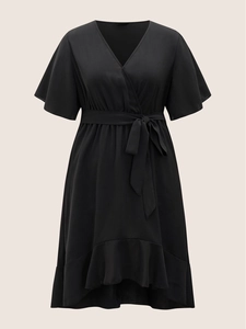 Elegant V-neck black wrap dress with ruffled high-low hem and tie waist for women