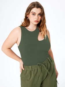 Detail of dark green ribbed knit tank top with stylish shoulder cutout and drawstring pants