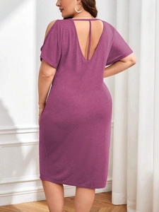 Detailed back view of a plus-size V-neck fuchsia dress with elegant ruching details