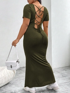 Slim fit olive green ribbed knit maxi dress featuring an open back with lace-up detail