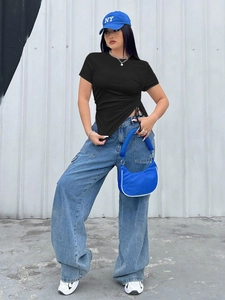 Detail of black slim-fit T-shirt with side drawstring and ruched asymmetric hemline