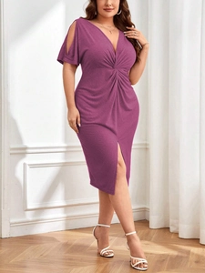 Detail of elegant V-neck plus size dress with waist knot, cold shoulder and front slit