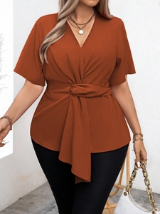 Elegant plus size V-neck short sleeve top in brick red with front twist knot design