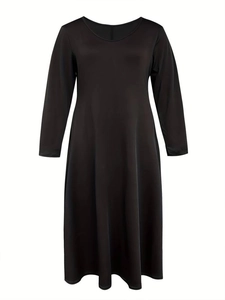 Minimalist long sleeve black midi dress with U-neck and elegant A-line slim silhouette