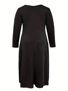 Back view of a minimalist black long-sleeve maxi dress with U-neck and loose fit style