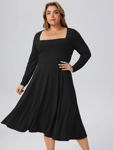 Elegant black long sleeve midi dress with a square neckline and cinched waist silhouette