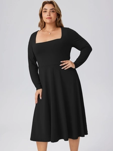 Elegant plus size black long sleeve dress with square neck and flared A-line skirt silhouette