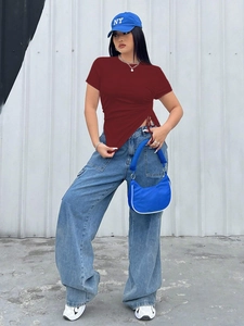 Detail of dark red short-sleeved T-shirt with side drawstring ruching and slim fit design