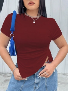 Detailed view of rib-knit fabric and side drawstring ruching on burgundy short sleeve t-shirt