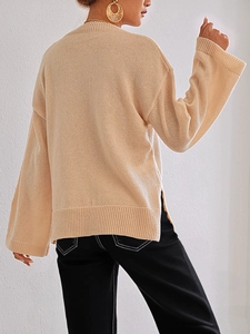 Beigefarbener Oversize-Strickpullover mit Kontrastnähten und Seitenschlitzen