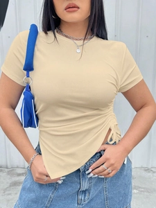 Close-up of ruched drawstring detail and asymmetric hem on a khaki ribbed short sleeve T-shirt