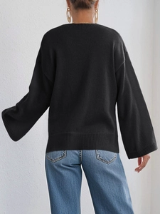 Minimalistischer schwarzer Oversize-Strickpullover mit Rundhalsausschnitt und Schleife