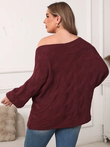 Oversize burgundy cable knit sweater with off-shoulder neckline and loose batwing sleeves