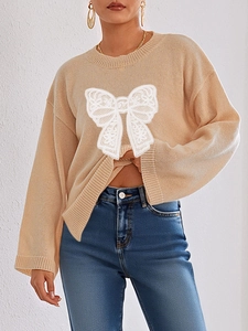 Women apricot long sleeve knit sweater with lace bow applique and ribbed crew neck