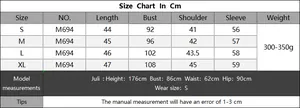 Detailed size chart for crop top sweater featuring bust and length measurements in centimeters