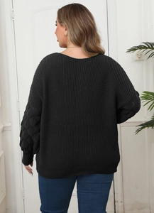 Detailed back view of black plus size sweater featuring unique 3D bubble pineapple sleeves