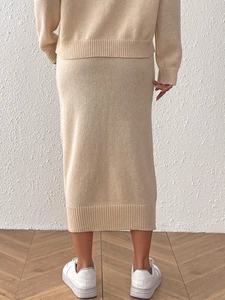 Elegant beige knit two-piece sweater and midi skirt set for women in casual autumn style