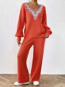 Orange knit two-piece set with V-neck sequined sweater and wide-leg trousers for women
