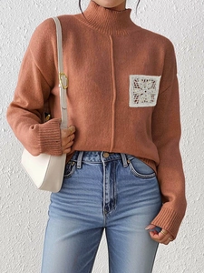 Caramel high neck knit sweater featuring a white hollow-out lace pocket detail for women