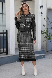 Detail of classic black and white plaid knit cardigan and pencil skirt with texture