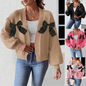 Detailed grid view showing lace bow accents on cardigan sweaters in four colors