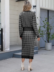 Rear view of women's black and white plaid knit cardigan and pencil skirt set