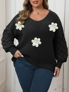 Detail of grey plus size V-neck sweater with white floral appliques and puff sleeves