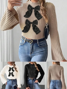 Women's cropped knit sweater with flared sleeves and black bow appliques in three colors