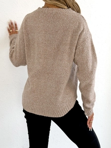 Detailed back view of casual knit sweater featuring textured fabric and ribbed cuffs