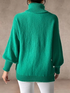Women's emerald green turtleneck sweater with ribbed knit details shown from back view