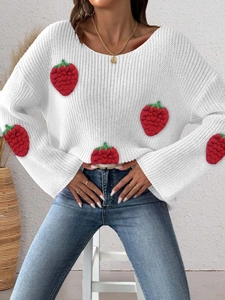 Detail of white knit sweater with 3D strawberry patches and wide boat neckline