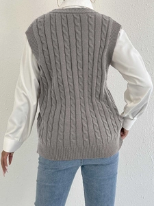 Women cable knit sweater vest in grey featuring vertical patterns and ribbed hem