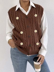 Women's brown cable-knit vest with V-neck, button-front, and white daisy floral embroidery