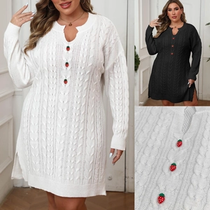 Detail of V-neck knit dress with unique strawberry buttons and cable knit texture