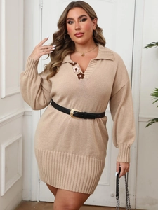 Detail of beige knit dress featuring a polo V-neck and 3D crochet flower embellishments