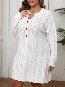 Detailed knit pattern on white V-neck sweater dress with red strawberry buttons