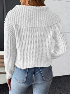 Detailed back view of a white chunky knit sweater with large lapels and ribbed texture