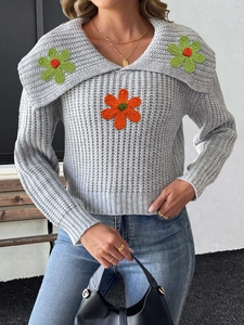 Women's gray knit sweater with wide collar and vibrant crochet floral embroidery