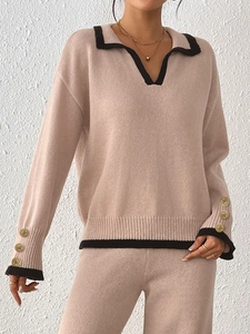 Women's knit polo sweater with contrast trim, lapel collar and gold button cuffs