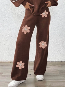 Women's brown knit set with floral embroidery featuring wide-leg pants and long-sleeve top