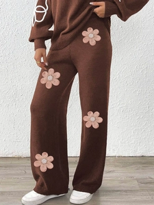Brown knit two-piece set with pink floral embroidery and wide-leg trousers for women