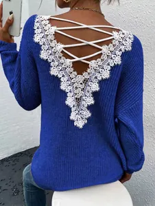 Deep blue long sleeve knit sweater with backless lace trim and criss-cross straps