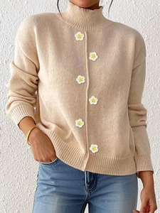 Jersey de punto beige de cuello alto con bordados de margaritas hechos a mano
